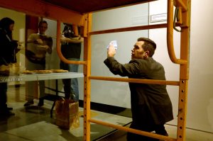 An Attempt At Transparency, or: Cleaning a Large Glass Wall (while listening to Howard Zinn’s A People’s History of the United States), or: The Spectacular Trap of Transparency, Performance and Installation, 2018